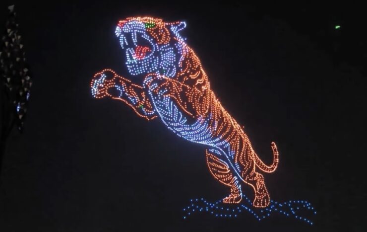 Guinness World Records drone light show with 2,983 drones at Mysuru Dasara festivalDescription: A record-setting drone light show in Karnataka, India, featuring a tiger image formed with 2,983 drones.